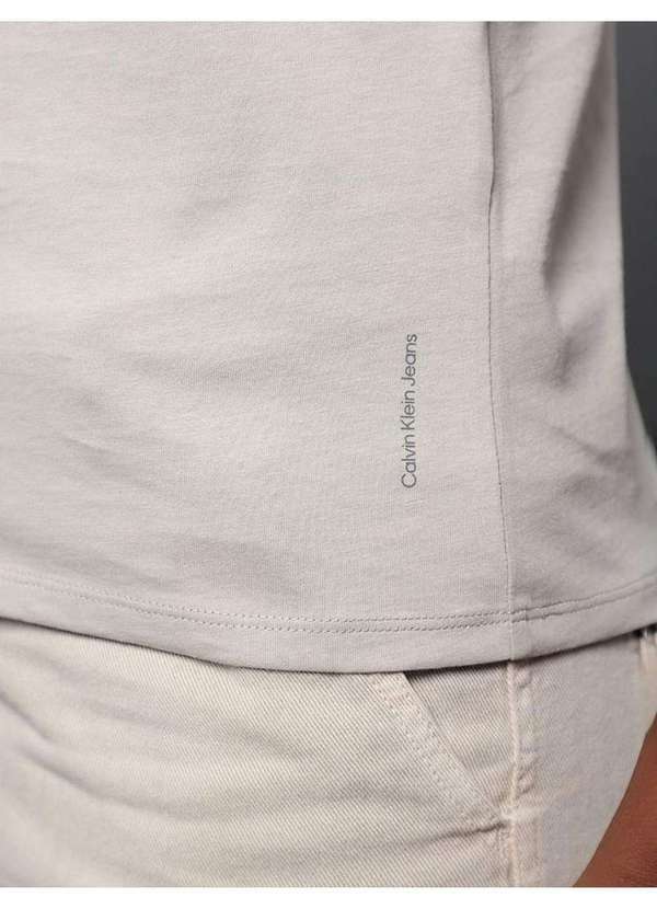 Calvin Klein Jeans - Camiseta Calvin Klein Jeans Feminina Essentials Estampa na Barra Bege